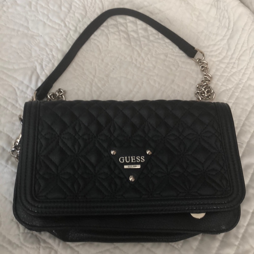 Guess mint condition cross body purse.